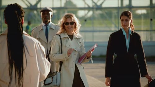 Successful Business Team Celebrating Outdoors in the Daytime