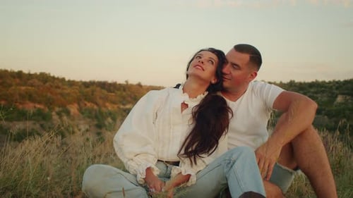 Romantic Couple Enjoying Sunset in Countryside