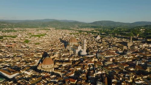 Aerial Slide and Pan Footage of Florence Cathedral and Surrounding Popular Landmarks in Tourist