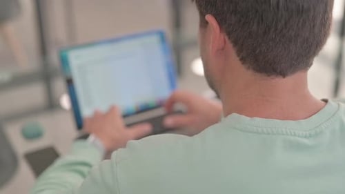 Close up of Man Typing on Laptop