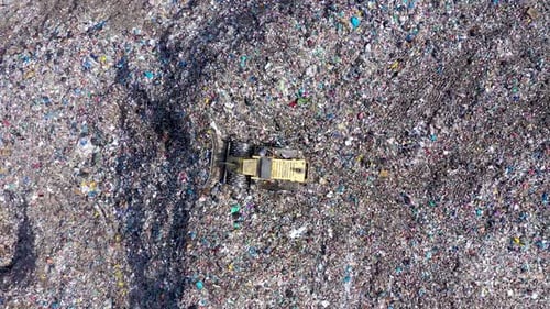 Slow Motion View of Large Garbage Pile, Trash Dump, Landfill, Waste Dumping Site Aerial