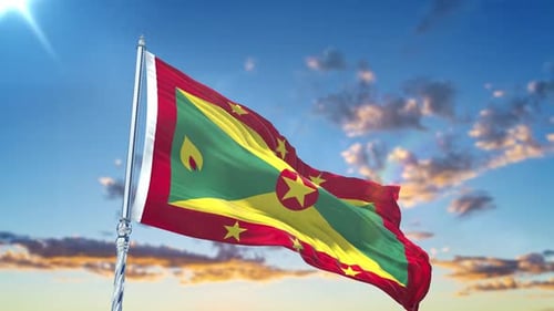 Grenada Flag Waving in Realistic Blue Sky with Clouds
