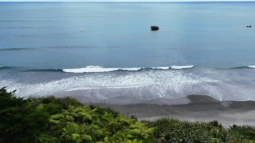 Aerial View of Coast with Waves and Lush Greenery West Coast of New Zealand Travel Nature