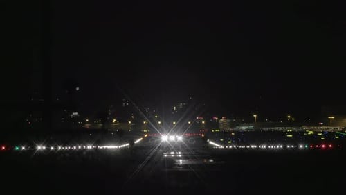 Commercial Airplane Landing at Airport Terminal Runway After Flight