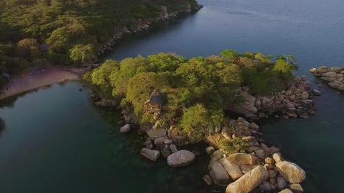 Aerial Drone Quadcopter of Luxury Water Front Hotel Resort on Island, Rustic