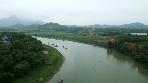 Big River in Vietnam Between the Big Mountains Surrounding the Green Valley