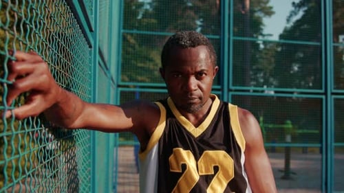 Footage of Confident African American Male Basketball Player Wearing Fashionable Sports Jersey
