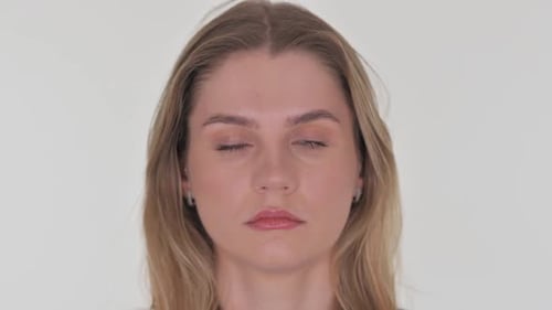Close up of Serious Woman Face on White Background