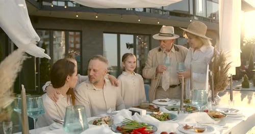 Family Celebration Meal Together in an Urban Setting