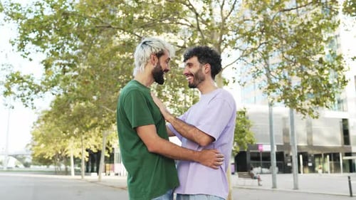 Young Adults Embracing on Urban Street