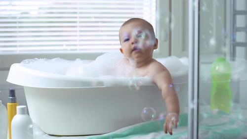 Cute Infant Enjoying Bubble Bath Time
