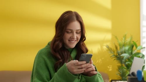 Girl Using Mobile Phone at Home Excited Student Getting Good News on Email
