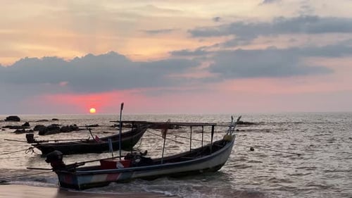 Fishing Boats on the Beach at Sunset