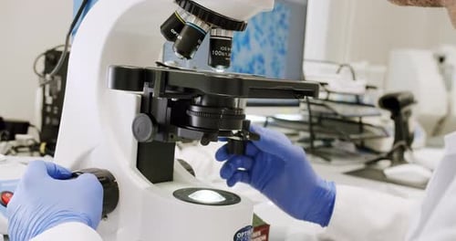 Examining Blood Under the Hightech Microscope Equipment