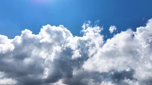 Clouds Floating in a Blue Summer Sky