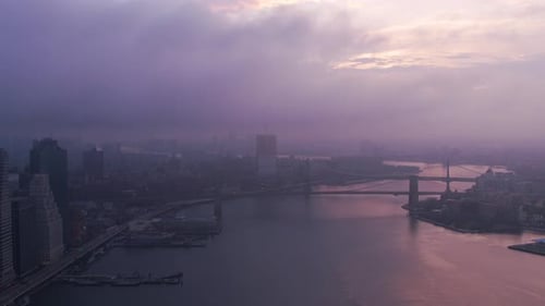 New York City Flying Up East River by Manhattan at Sunrise