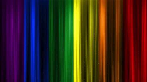 Animated Rainbow Vertical Light Rays with Shimmering Particles