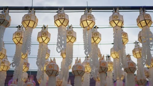 Hanging one hundred of multi colours lantern light lamp for Loy Krathong Festival in Lampune.