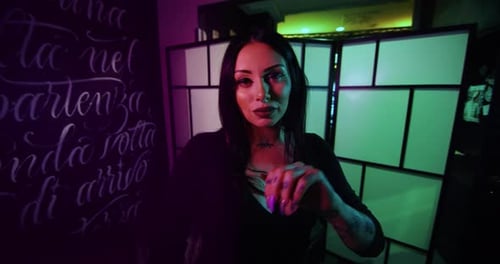 Milan/Italy-01.02.2019:Slow motion close up of young brunette long hair female master of the art o