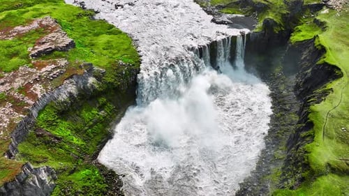 Waterfall in Canyon Mountain River in Summer Sunny Day Nature in Iceland Famous Tourist Attraction