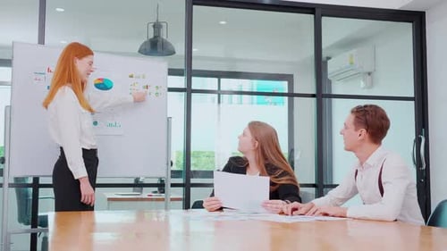 Business Team Achieves Success in Bright Office