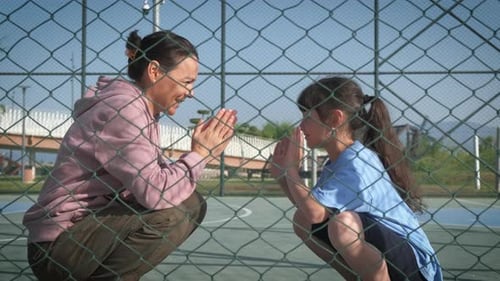 A Mother and Daughter are Playing