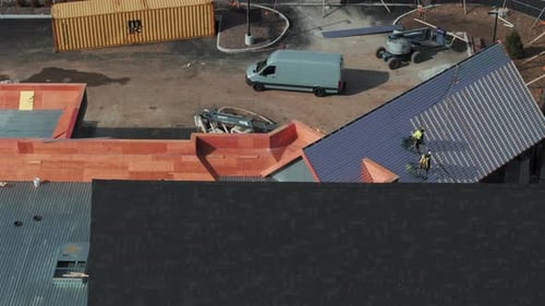Installing a New Roof on an Industrial Building or Warehouse Aerial View