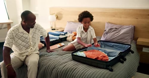 Father, kid and packing suitcase in home for holiday trip, weekend getaway