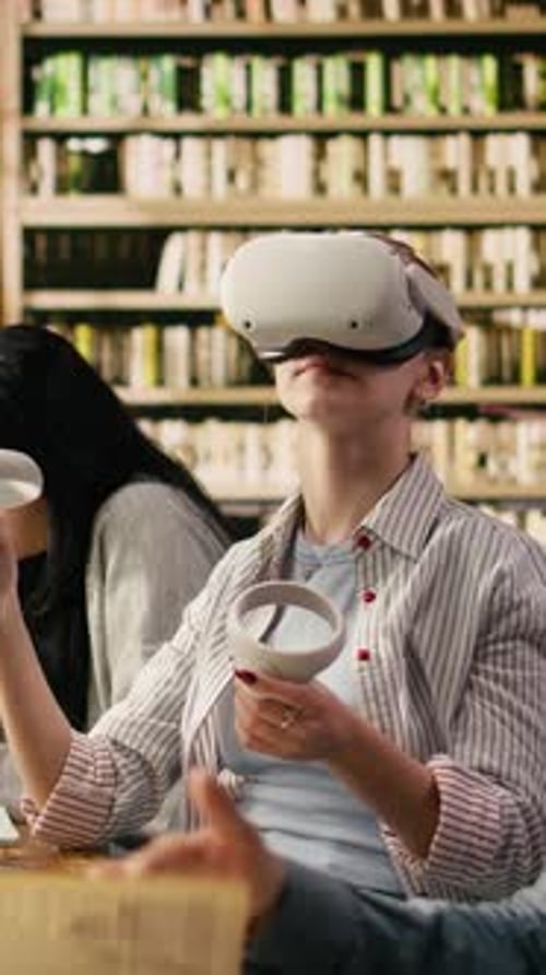 Vertical Video Student Using VR Device and Controller to Explore Immersive Learning