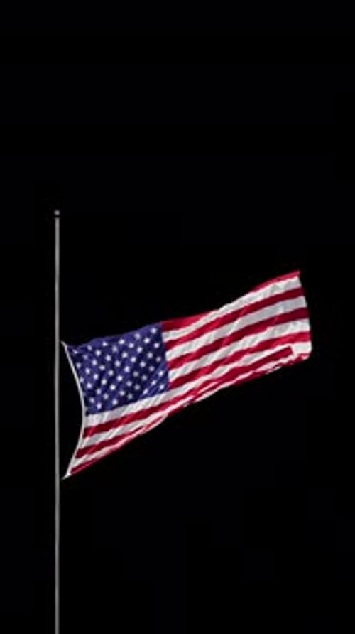American Flag Waving at Half-Mast for Remembrance