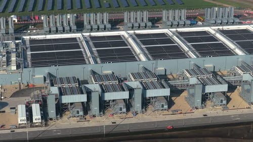 Aerial view of ai cloud data center with solar panels
