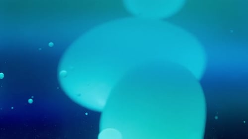 Abstract blue lava bubbles flowing in liquid on a dark blue background