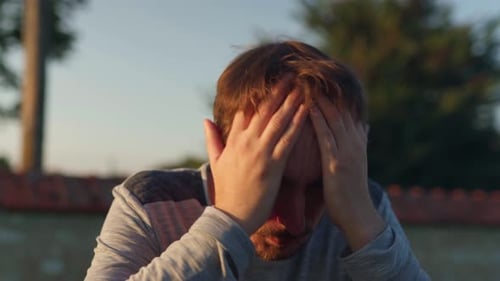 Young adult male suffering in silence. Possible mental health problems