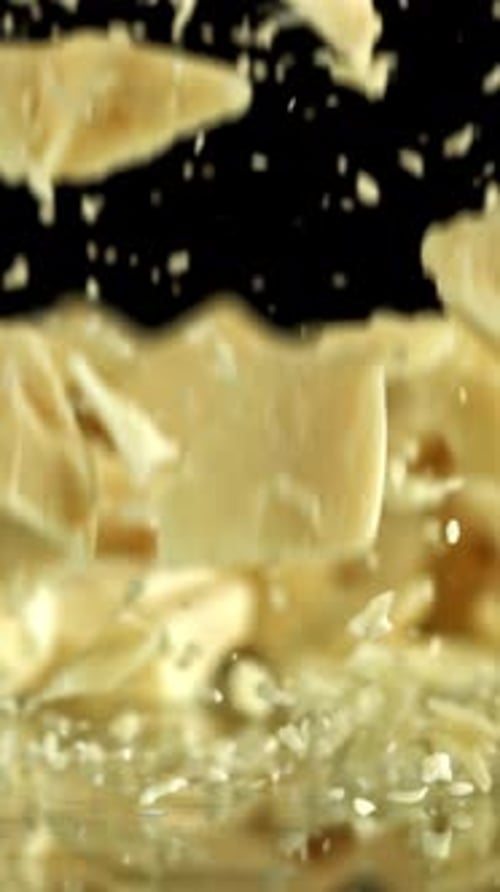 Super Slow Motion Pieces of White Chocolate Filmed on a Highspeed Camera at 1000 Fps