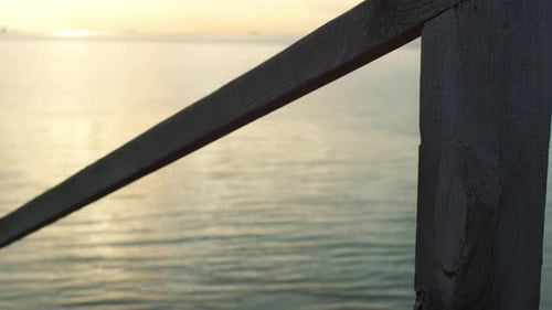 Sunset Sea Beach Bridge Construction in Nature Landscape Background. Beautiful Ocean Shore