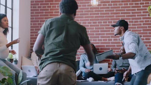 Collaborative Team Meeting in Hip Urban Office