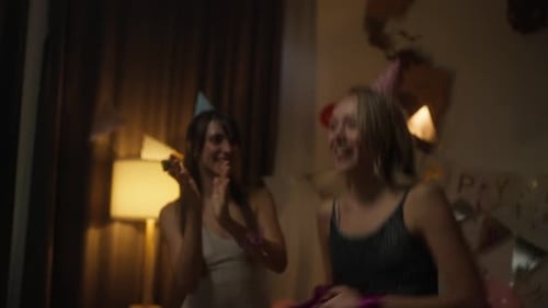 Enthusiastic Young Adults Celebrate Birthday Party Indoors