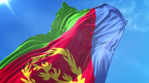 Realistic Flag Blowing in Bright Blue Sky