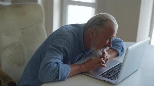 Highangle View of Exhausted Unhappy Senior Aged Man with Grayhaired Beard Feeling Strong Back Ache