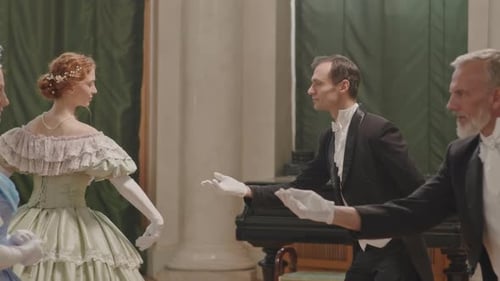 Adults in Formal Wear Prepare for Historical Ballroom Dance