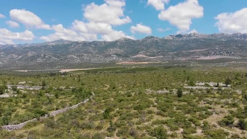 Ascending aerial shot of a mountain range
