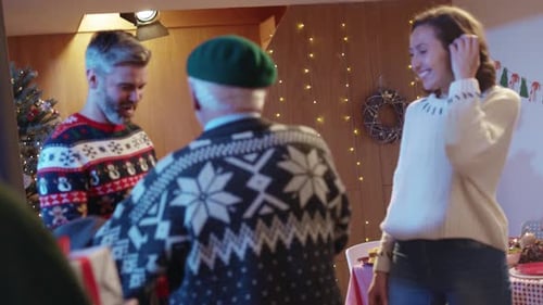 Family Arriving for Christmas with Gifts