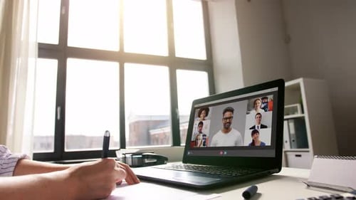 Remote Job, Technology and People Concept - Young Businesswoman with Laptop Computer