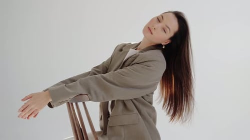 Glamorous Woman Posing in Blazer in Studio