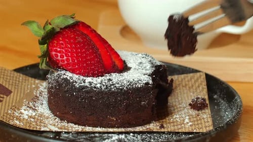Chocolate Cake with Strawberry on a Plate