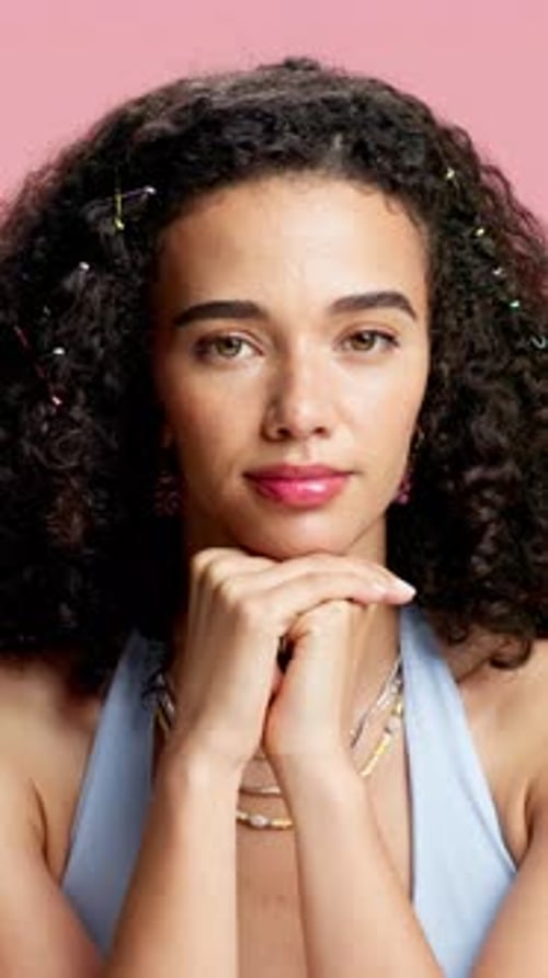 Beauty, makeup and face of woman in studio for salon, self care and shine