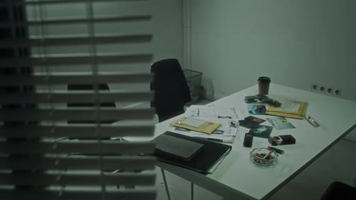 Table with Evidence in Interrogation Room at Bureau of Investigation