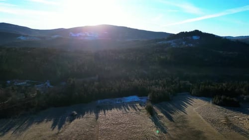 Scenic Aerial View of Mountains and Fields
