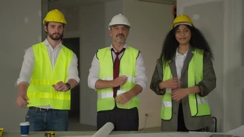 Construction Workers Smile On Construction Site