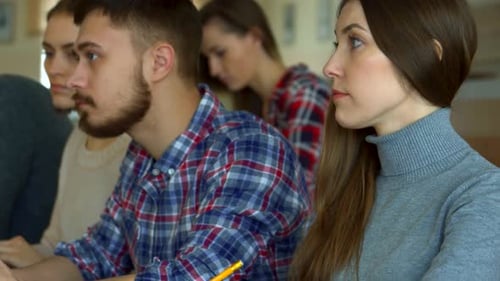 Engaged Young Students Studying Together in a Vibrant College Setting